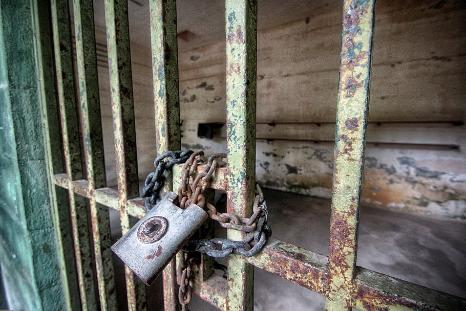 prison, bars, lock, chains, bondage, despair, darkness, freedom, Penang War Museum, WW2, caged