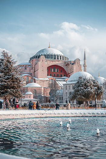 Hagia Sophia, Istanbul, winter, snow, architectural grandeur, scenic view, Turkey, domes, minaret, fountain, trees