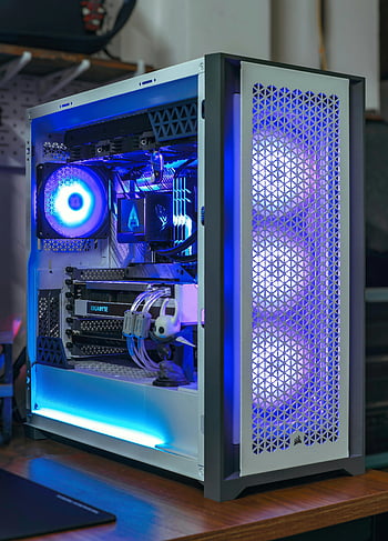 modern computer case, RGB lighting, sleek desktop PC, vibrant blue, modern technology, computer components, PC build, custom PC, computer hardware, gaming PC, tech setup