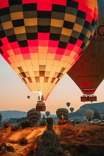 hot air balloons, Cappadocia, sunrise, colorful balloons, travel scene, mesmerizing view, Turkey, balloon ride, unique landscape, travel destination, adventure travel