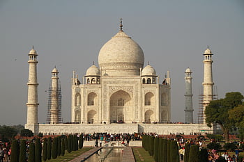 Taj Mahal, gloomy sky, Mughal architecture, iconic landmark, tourists, India, Agra, white marble, domed structure, minarets, reflection pool