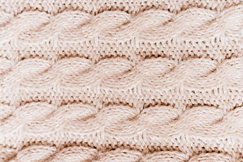yarn patterns, close-up, soft woolen fabric, intricate knit patterns, detailed view, knit texture, wool texture, fabric texture, textile patterns, knitting details, cable knit