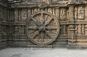 Konark Sun Temple, carved stone wheel, ancient Indian art, sculptures on wall, Puri, Odisha, India, detailed view, temple architecture, stone carvings, historical monument