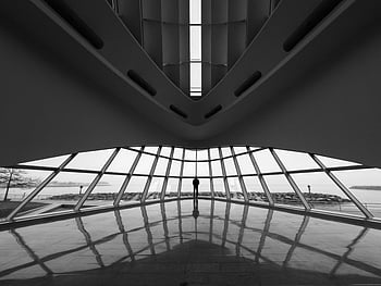 symmetrical architecture, lone figure, modern architecture, black and white, lake view, architectural space, reflection, minimalist design, geometric shapes, interior design, symmetry