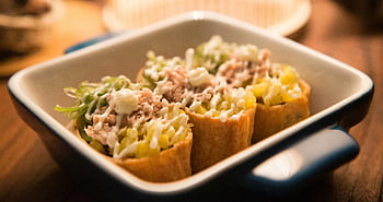tacos, baked tacos, vegetable tacos, meat tacos, cheese tacos, sauce tacos, black and white ceramic bowl, close-up tacos, garnished tacos, taco dish, taco meal