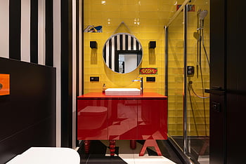 colorful bathroom, red cabinet, yellow tiles, contemporary bathroom, artistic decor, sink, mirror, toilet, vibrant bathroom, modern bathroom, striking design