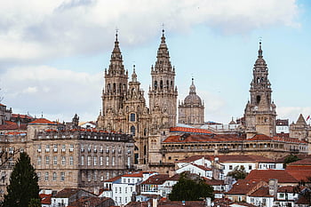 Santiago de Compostela Cathedral, Spain, historic cityscape, iconic cathedral, European architecture, religious landmark, Galicia, Spain tourism, medieval architecture, Spanish heritage, cathedral spires