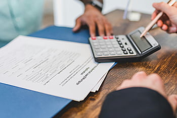 real estate agent, calculator, financial transaction, real estate documents, desk, hands, meeting, financial calculation, real estate, documents, desk meeting