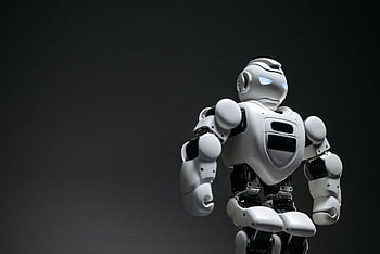 white toy robot, close-up shot, futuristic robot, studio shoot, innovation design, robot design, close-up photography, futuristic design, robot technology, studio photography, white robot