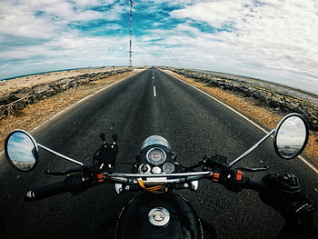 motorcycle ride, Dhanushkodi road, countryside highway, vibrant blue sky, scenic road, open road, biker, motorcycle, thrilling ride, scenic countryside, open countryside