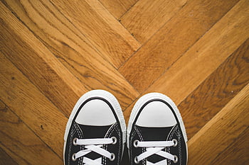 Black and White Converse, All Star Low Top, sneakers, black sneakers, white laces, wooden parquet floor, close-up, fashion, footwear, casual shoes, street style
