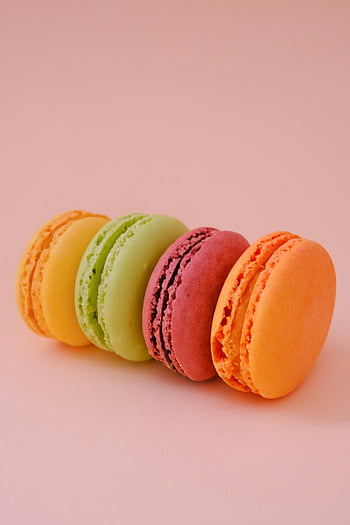 colorful-macarons-pink-background-vibrant-pastel-hues-sweet-display-macarons-arrangement-pastel-macarons-pink-backdrop-colorful-treats-dessert-photography-macaron-variety-thumbnail.jpg