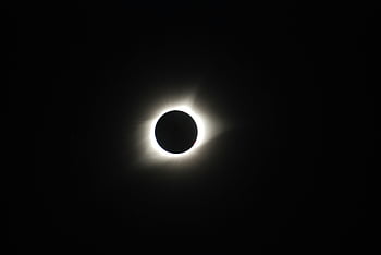 solar eclipse, total solar eclipse, sun's corona, dark sky, captivating image, eclipse view, celestial event, astronomical phenomenon, eclipse photography, natural wonder, cosmic spectacle