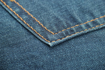 blue denim, textile, macro shot, intricate stitching, denim fabric, close-up, blue jeans, denim texture, fabric detail, textile texture, denim stitching