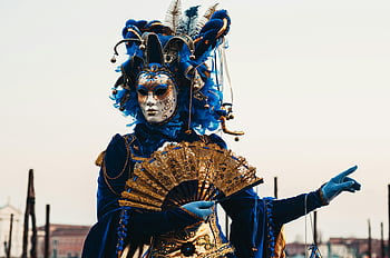 Venice Carnival, blue dress, masked figure, elaborate costume, vibrant costume, blue costume, carnival mask, Venetian mask, festive attire, traditional costume, Venice event