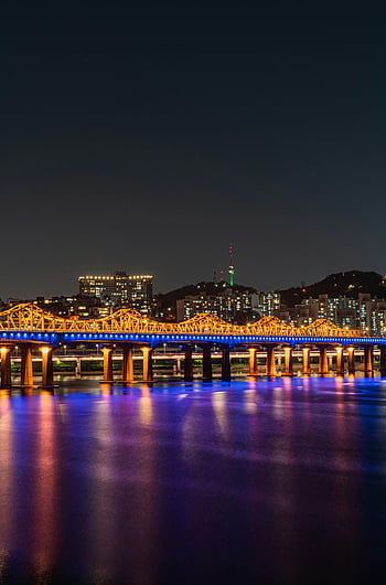 Dongho Bridge, Han River, Seoul, South Korea, night time, illuminated bridge, vibrant city lights, cityscape, river reflection, urban night scene, landmark
