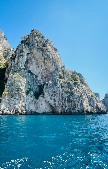 capribukse, Kystbergformasjoner, levende blå hav, Italia, Campania-regionen, hoppe, Fantastisk kyst, steinformasjoner, blå hav, Italias Campania, Capri-kysten