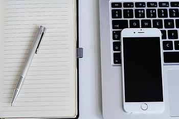 Silver iPhone 6, notebook, click pen, smartphone, laptop, modern workspace, close-up, office desk, productivity tools, tech gadgets, workspace setup