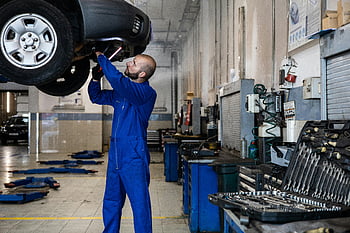 mechanic, blue suit, car inspection, auto workshop, maintenance services, repair services, raised car, vehicle maintenance, automotive repair, workshop tools, mechanic tools