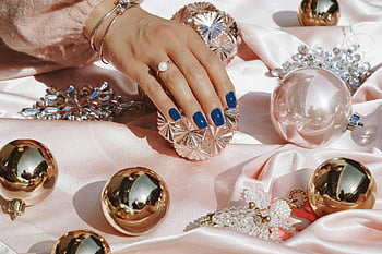 gold ring, blue manicure, stylish hand, pink satin, opulent ornaments, jewelry, blue nails, crystal ball, gold ornaments, bracelet, pearl ring