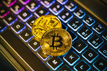 Bitcoin, illuminated keyboard, cryptocurrency, technology integration, gold bitcoins, colorful keyboard, close-up, digital currency, tech finance, financial technology, crypto assets
