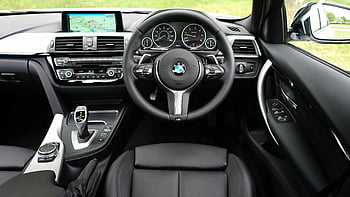 ตกแต่งภายใน BMW, bmw สีดำ, แดชบอร์ดที่ทันสมัย, ระบบนำทาง, รถหรู, ตกแต่งภายในรถยนต์, รถ BMW, หนังสีดำ, แผงควบคุมรถ, การออกแบบตกแต่งภายในรถยนต์, BMW หรูหรา