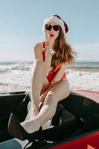Santa hat, red bikini, convertible car, beach, posing, swimwear, woman, car, beach scene, convertible, bikini