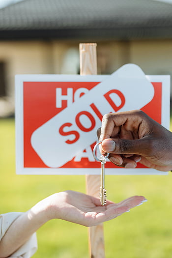 key exchange, hands, sold sign, real estate transaction, house key, property sale, home sale, key handover, real estate, successful transaction, house purchase