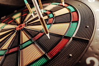 dart pins, electric dartboard, close-up, vibrant colors, precision darts, target, electronic dartboard, detailed shot, dart game, dartboard closeup, hitting target