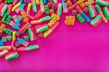 gummy-candies-colorful-candies-pink-background-sweet-tooth-vibrant-assortment-close-up-photo-gummy-bears-gummy-worms-candy-photography-candy-themes-thumbnail.jpg