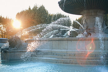 ornamental fountain, sunny park, elegant fountain, sculptures, water spray, light flare, outdoor fountain, park fountain, decorative fountain, fountain sculptures, sunny day fountain