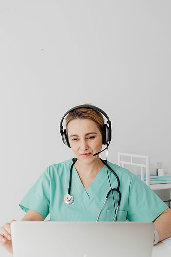 telemedicine, doctor, patient, internet, laptop, healthcare worker, medical scrubs, headset, stethoscope, virtual consultation, online healthcare