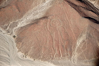 Nazca Lines, Astronaut geoglyph, aerial photograph, Peru, ancient geoglyphs, desert art, archaeological site, Nazca culture, geoglyphs in Peru, aerial view, close-up Nazca Lines