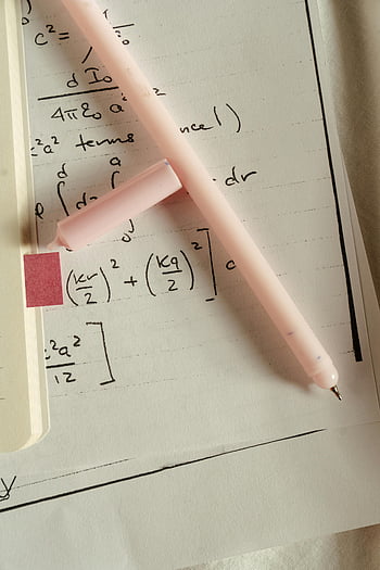 pink pen, white paper, mathematical equations, overhead view, education concepts, study concepts, pink writing tool, math notes, study materials, academic tools, educational resources
