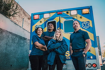 paramedic team, ambulance, diverse team, confident, outdoors, emergency services, medical professionals, emergency vehicle, healthcare workers, rescue team, paramedics