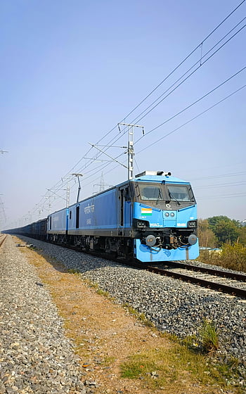blue cargo train, rail tracks, Greater Noida, India, clear sky, electric train, railway, transportation, freight train, locomotive, WAG-12B
