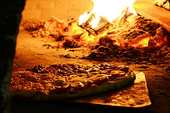 pizza, wood-fired oven, Italian cuisine, traditional oven, mouthwatering pizza, cooking pizza, wood-fired cooking, pizza in oven, Italian pizza, fireplace, wood fire