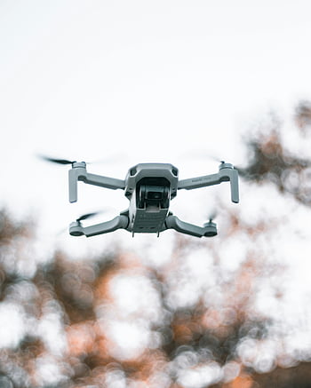 modern drone, flying drone, nature, trees, forest background, sky, blurred forest, outdoor photography, aerial view, technology, mavic mini