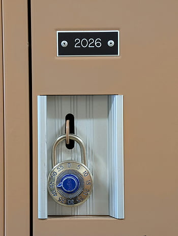 secure locker, combination padlock, safety locker, locker with combination lock, locker number, secure storage, padlock on locker, locker safety, secure storage locker, blue combination lock, numbered locker.