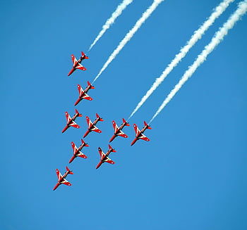 aircraft exhibition, red airplanes, aerobatics, clear blue sky, trails, team formation, sky show, air show, aviation display, flight performance, jet planes