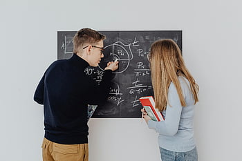 students working, calculations, trigonometric equations, blackboard, enhancing learning, collaborative learning, math education, classroom activity, educational environment, student interaction, problem solving
