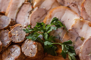 sliced meat, sausages, fresh parsley, appetizing, ready to serve, close-up, plate, garnished, sliced sausages, meat dish, parsley garnish