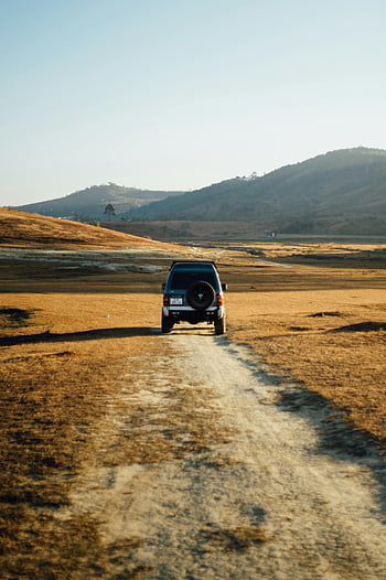 Mitsubishi Pajero, dirt road, SUV, hills, bright sky, off-road, outdoor adventure, landscape, travel photography, vehicle, nature
