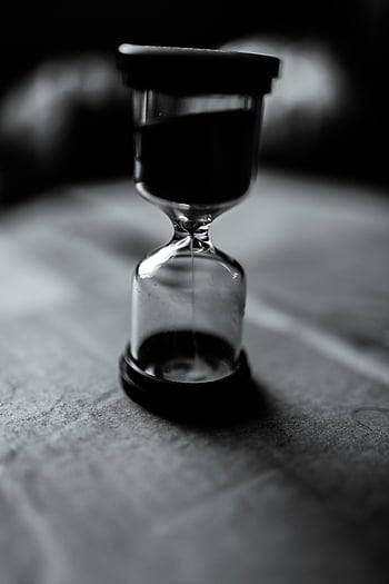hourglass, black and white, time symbol, soft focus, classic hourglass, tilt shift lens, sand timer, monochrome image, time passage, vintage hourglass, black and white photography