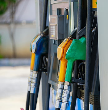 gasoline pumps, close-up photography, vibrant fuel nozzles, gasoline station, diesel options, gas options, petrol options, fuel pumps, gas station, fuel nozzles, close-up image