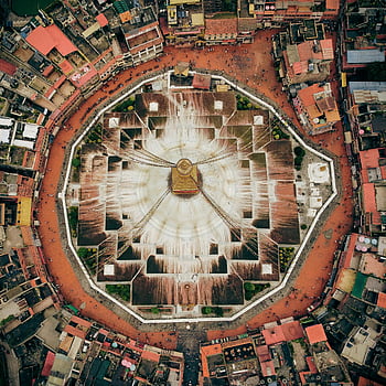 Boudhanath Stupa, Kathmandu, Nepal, aerial shot, Buddhist temple, architectural beauty, bird's eye view, iconic landmark, circular design, urban landscape, cultural heritage