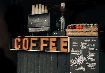 coffee, brown signage, coffee shop, vintage decor, menu, bottled drinks, coffee display, coffee menu, coffee shop decor, vintage coffee shop, coffee shop menu