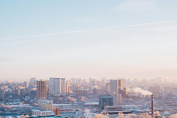winter cityscape, Rostov-on-Don, pastel dawn sky, urban skyline, snowy rooftops, serene winter, city view, winter dawn, city skyline, winter city, snowy city