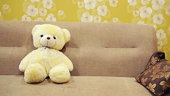 teddy bear, sofa, yellow teddy bear, floral wallpaper, kids room decor, cozy teddy bear, stuffed animal, home decor, living room, soft toy, plush toy
