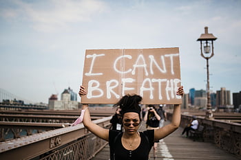 protester, I Can't Breathe, demonstration, bridge, cardboard sign, woman holding sign, social justice, protest, outdoor protest, city background, activism